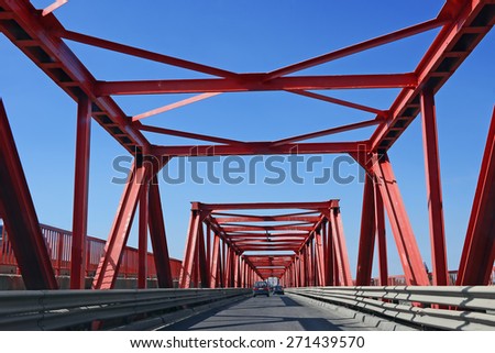Red Iron Bridge. View of the Road From the Inside. Receding Into the Distance Perspective