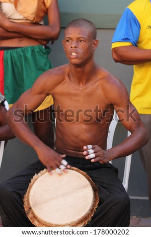 FALMOUTH, JAMAICA Ã¢Â?Â? MAY 11: An unidentified street performers playing outside the port of Falmouth on MAY 11, 2011 in Jamaica ahead of the national labor day celebrations.