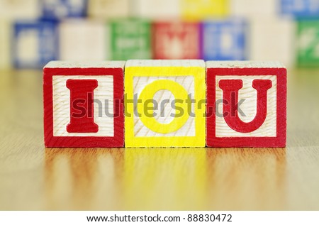 Alphabet Blocks Spelling out IOU
