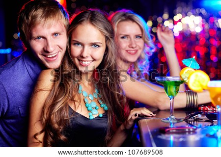 Image Of Happy Friends Looking At Camera At Party Stock Photo 107689508 ...