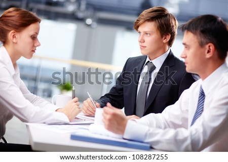 Business team meeting to discuss recent business questions