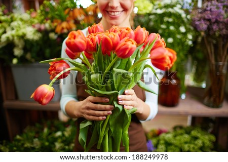 Image, Stock Photo Woman smells red tulips