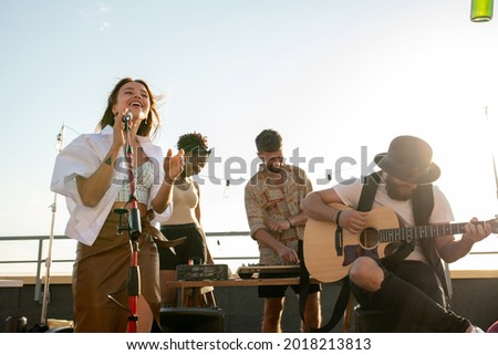 Similar – Foto Bild Gitarrist tritt bei einem Musikkonzert auf.