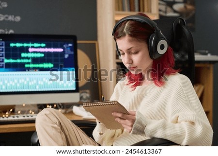 Image, Stock Photo Musician writing in a notebook