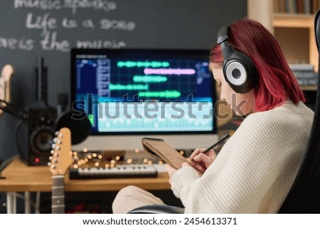 Similar – Image, Stock Photo Musician writing in a notebook