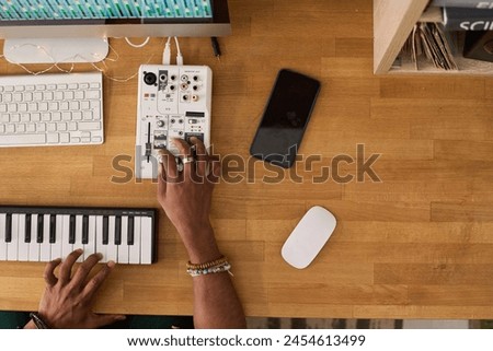 Similar – Image, Stock Photo top view of unrecognizable woman at home doing video call with friends on mobile phone while cute jack russell dog resting on bed. Home office, Pets, love and relax