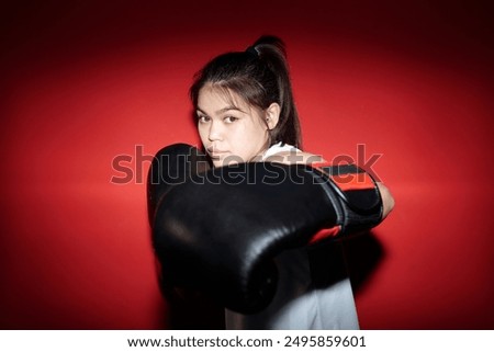 Similar – Image, Stock Photo Female boxer punching camera