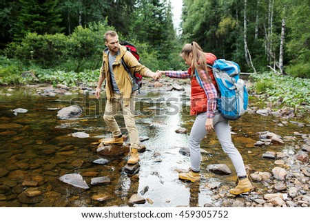 Similar – Menschen, die einen Fluss mit dem Kajak überqueren