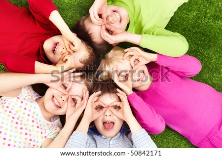 Similar – Image, Stock Photo Smiling children lie together in a tent at a camping site. Family time, family vacation, hiking on the weekend