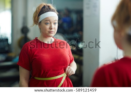Similar – Image, Stock Photo Fit woman standing against sea during workout