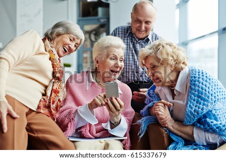 Similar – Image, Stock Photo Elderly man looking through window in twilight