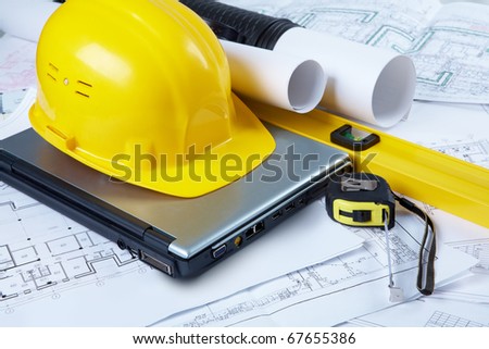 Image, Stock Photo blueprints, protective helmet, laptop,house model and tools on architect workspace.Construction site