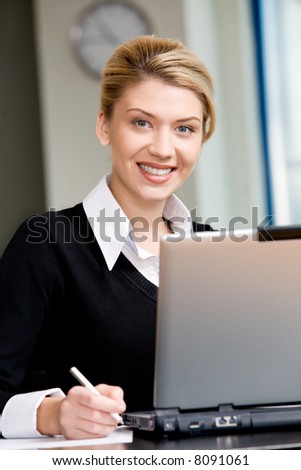 Portrait of confident business woman looking at a camera