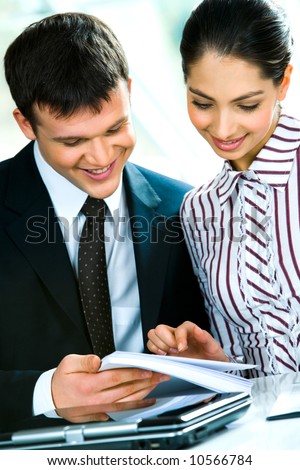 Portrait of business man and woman working together