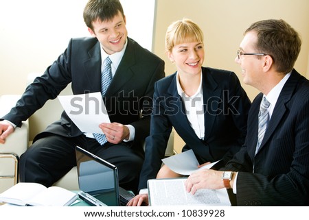 Business man and woman looking at boss of company during   negotiations