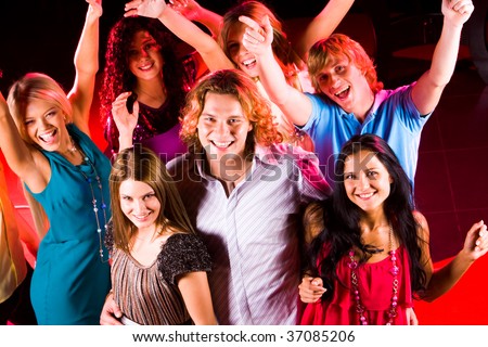 Joyful Teens Having Fun In Night Club While Dancing Stock Photo ...