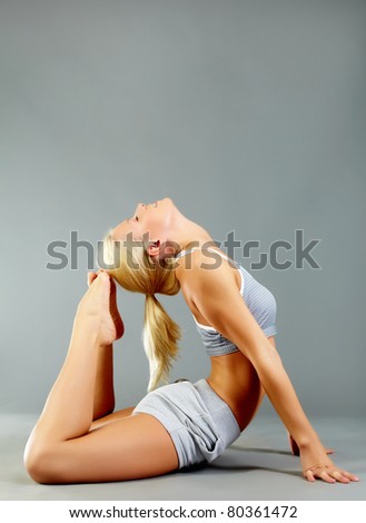 Image of female doing stretching exercise in isolation