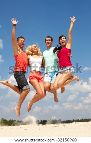 Portrait of four jumping happy people - Stock Image - Everypixel