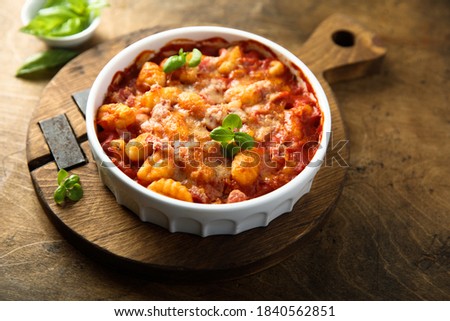 Similar – Foto Bild Gnocchi mit Tomatensauce und Parmigiano auf einem Teller.