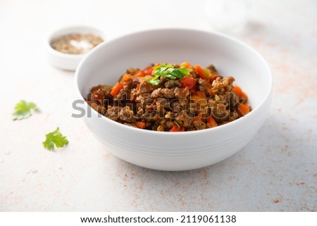 Similar – Image, Stock Photo Bowl of minced meat near eggs and herbs