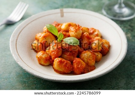 Similar – Foto Bild Gnocchi mit Tomatensauce und Parmigiano auf einem Teller.