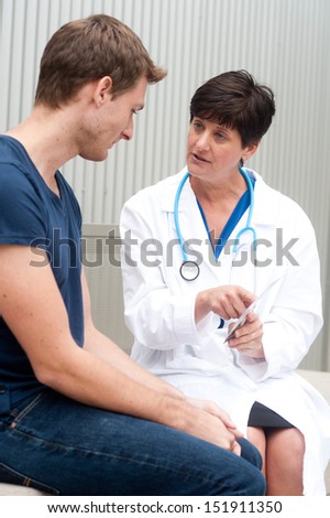portrait of female doctor with patient at office