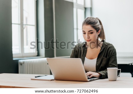 Similar – Image, Stock Photo Cute blonde girl working in the morning on a laptop and drinking coffee. Work online, freelance, social distance
