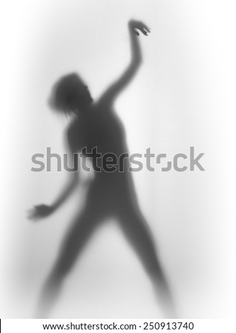 Beautiful slim woman dancing silhouette