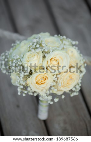 Wedding flowers white roses bouquet. Marriage flowers bouquet. sunset.
