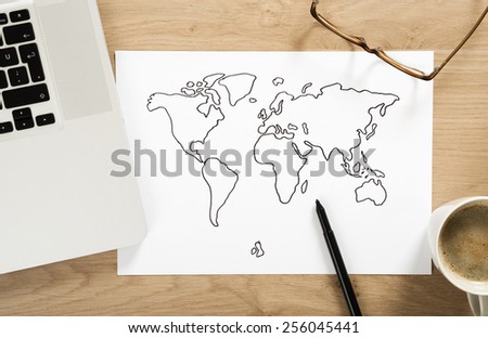 world map sketch on the office desk