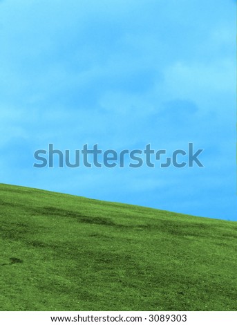 Green lawn and the blue sky. This photo - an ideal material for creation of a collage.