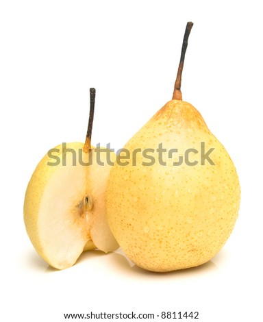The ripe juicy pears covered by drops of water. Isolation on white, shallow DOF.