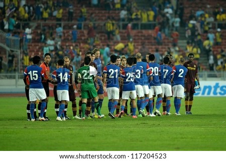 KUALA LUMPUR - JULY 30: All Player shake hands after finish the game during Manchester City friendly match against Malaysia at National Stadium, Kuala Lumpur in July 30, 2012. Manchester City won 3-1.