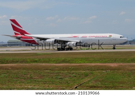 SEPANG, MALAYSIA - AUGUST 5: Air Mauritius plane Airbus A340-300, Registration name 3B-NBE, take-off at KLIA airport on August 5, 2014 in KLIA, Sepang, Malaysia.