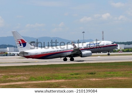 SEPANG, MALAYSIA - AUGUST 5: Malaysia Airline plane Boeing 737-800FZ, Registration name 9M-MLF, take-off at KLIA airport on August 5, 2014 in KLIA, Sepang, Malaysia.