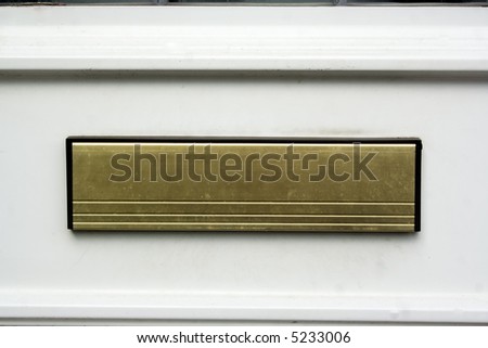close up of letter box on house front door