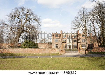 historic English mansion house and entrance gate