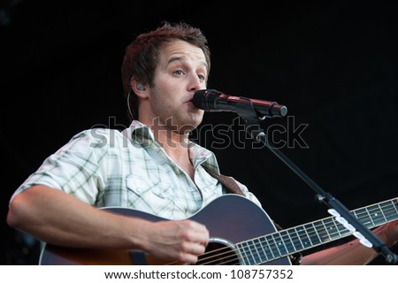 WHEATLAND, CA - JULY 23: The Easton Corbin opens for Brad Paisley for The Escape Virtual Reality World Tour at Sleep Train Amphitheater in Wheatland, California on July 23, 2011