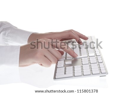 Woman typing on keyboard on white background