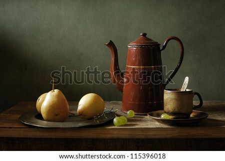 Still life with yellow pears and an old coffee pot