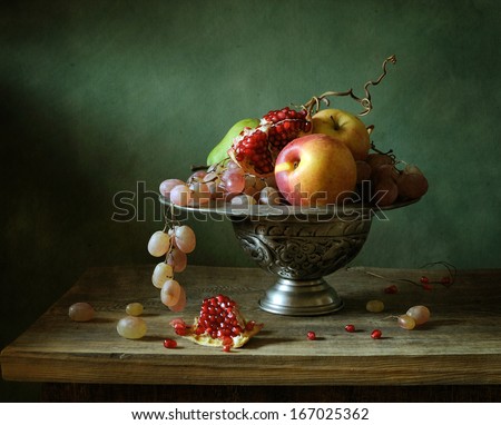 Still life with fruit on a tin plate
