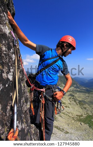 Climber on climbing route in Retezat mountains, Romania