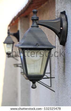 Outdoor electrical lamps hanging on the wall