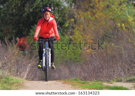 Cyclist riding a bike on the trail