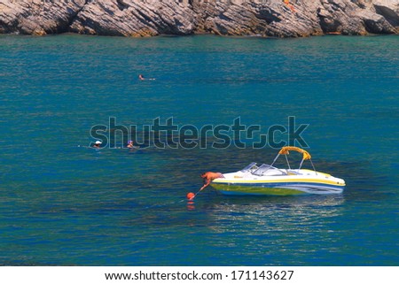 White power boat on the turquoise Adriatic sea