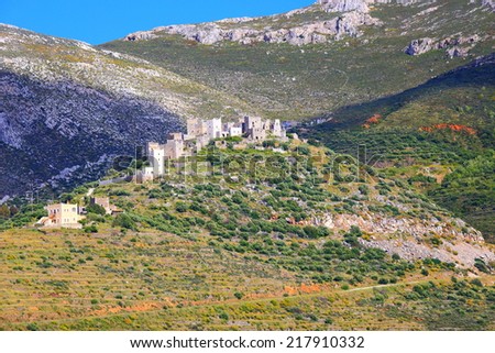 Traditional tower houses on top of a hill near Vatheia, Greece