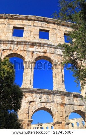 Detail of stone arches of ancient Roman amphitheater, Pula, Croatia
