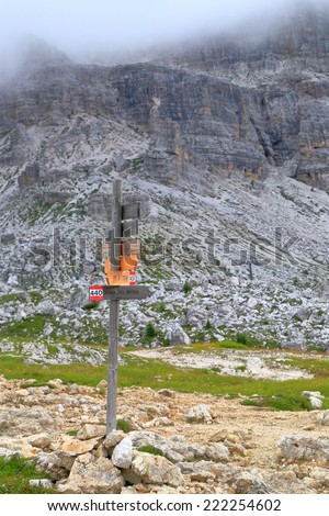 Direction indicator on the mountain trail, Dolomite Alps, Italy