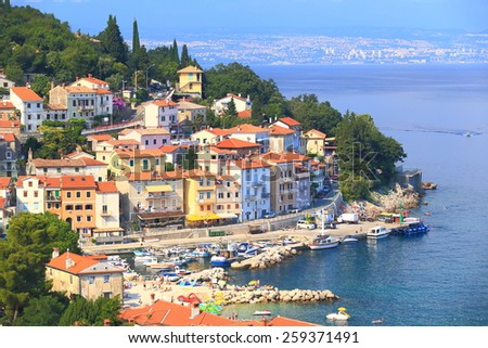 Adriatic sea bay with traditional harbor and buildings on Istria peninsula, Croatia
