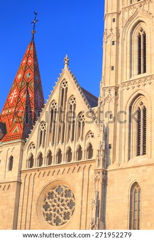 Gothic architecture on the sunny facade of St Matthias church in Budapest, Hungary